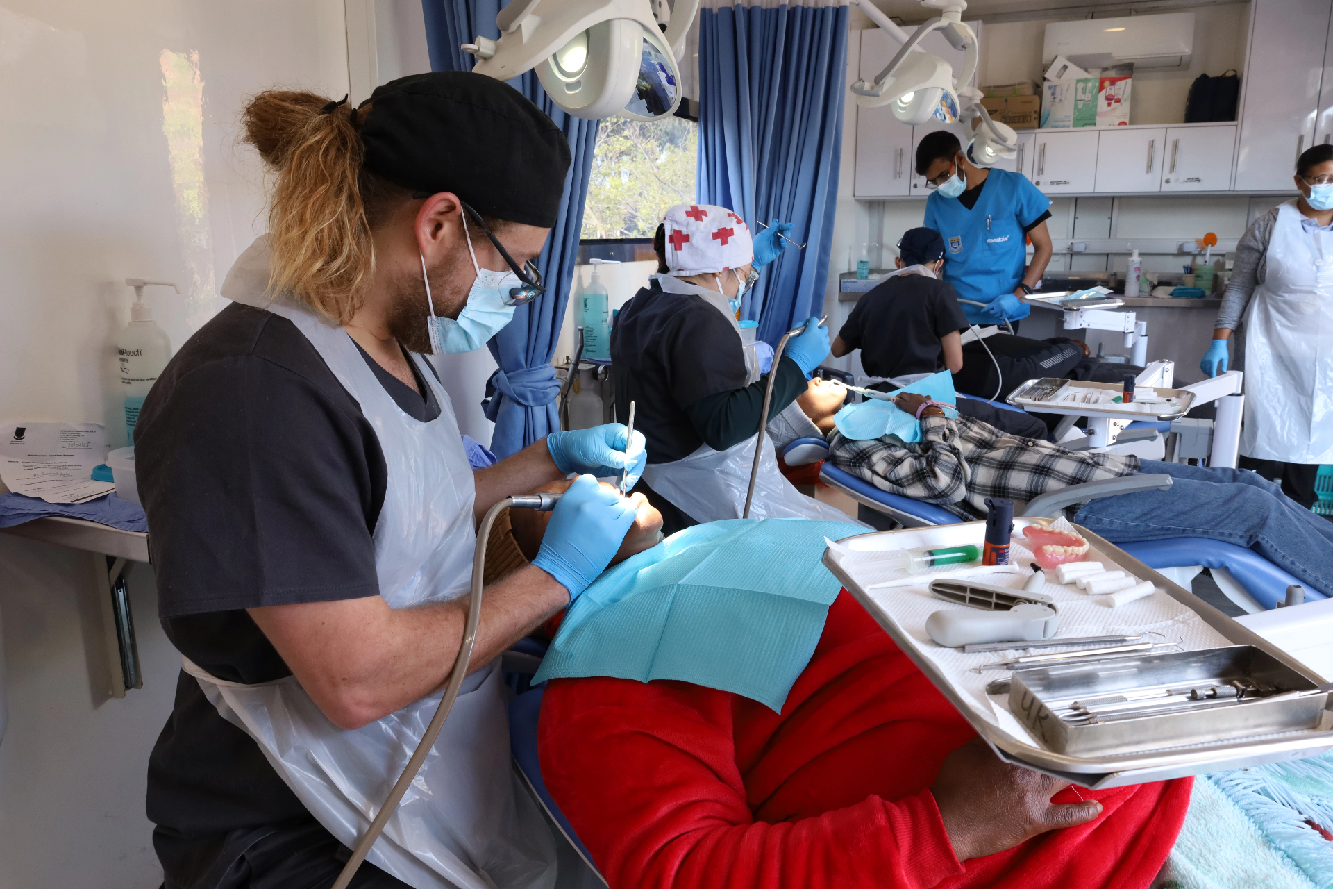 Students delivering dental care in a community clinic